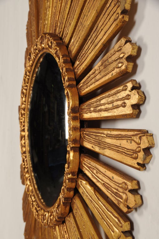 Gold Leaf Gilded wood sunburst mirror from France c. 1950