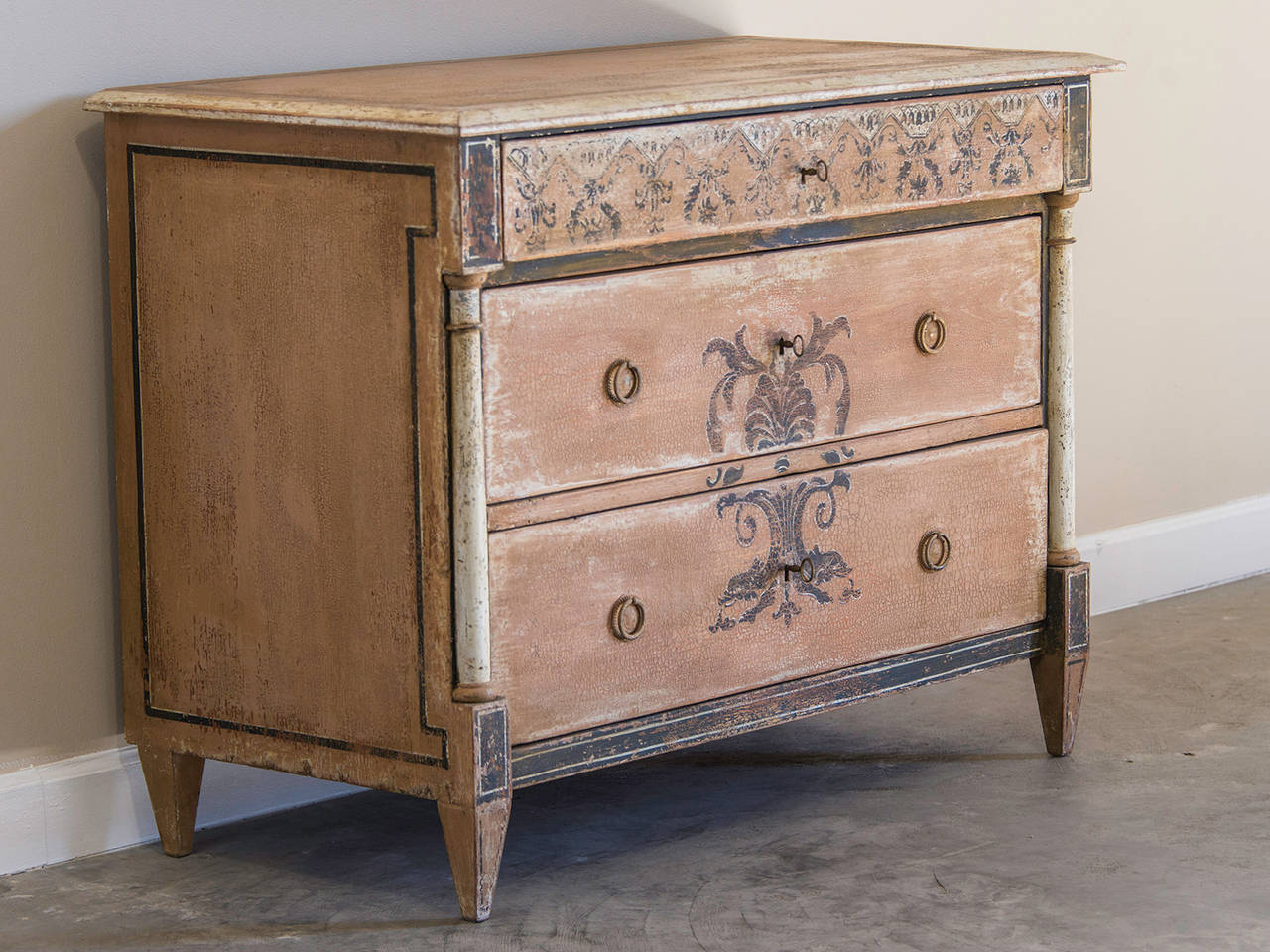 Empire Period Neoclassical Chest of Drawers, Germany c.1820, Painted Decoration. This handsome chest features a half column on both the left and right sides that flank the middle and lower drawer and support the top drawer that extends further