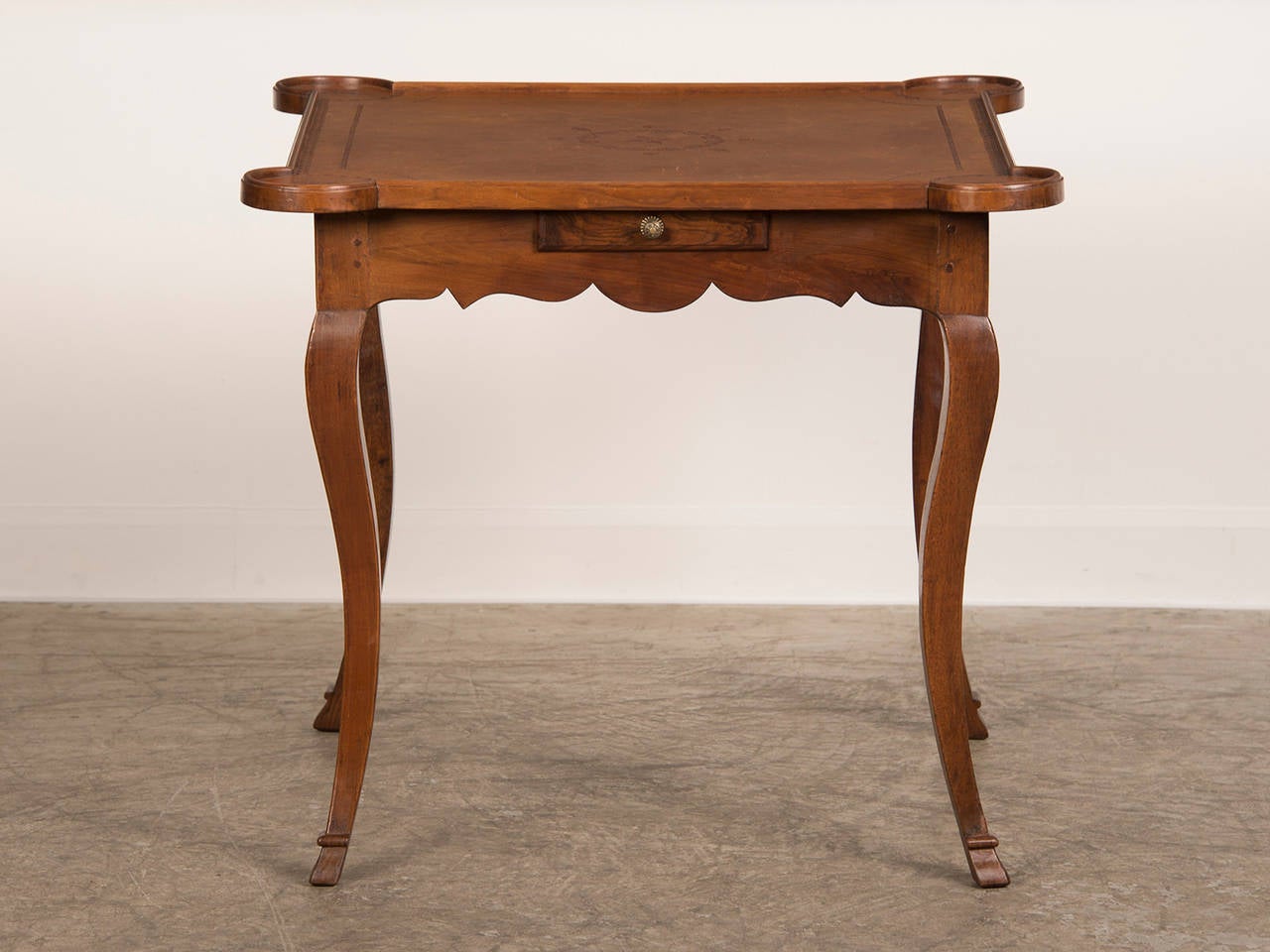 Receive our new selections direct from 1stdibs by email each week. Please click Follow Dealer below and see them first!

An antique French Louis XV period walnut game table circa 1750, each leg ending in a hoof foot (pied de biche) having a drawer