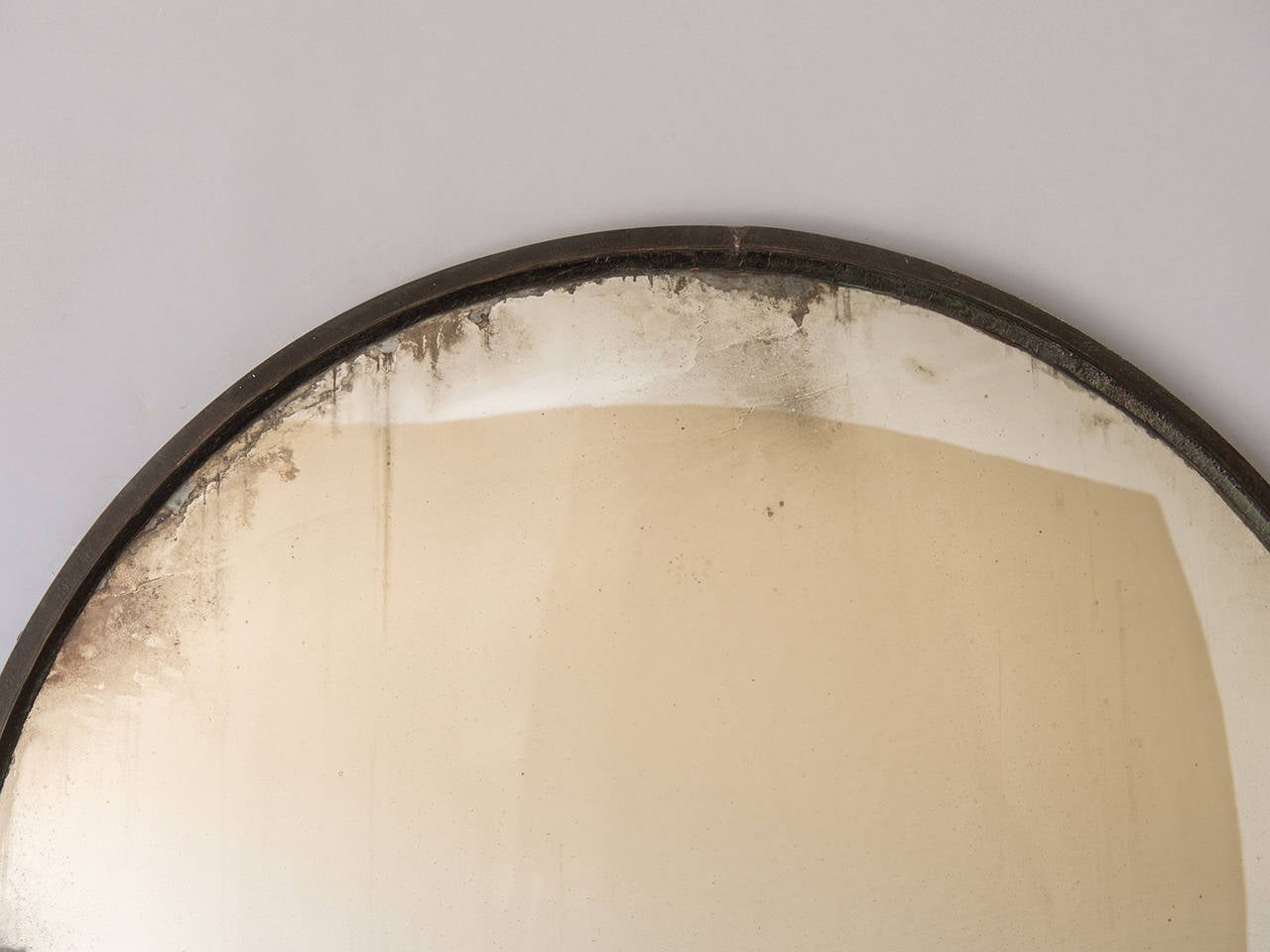 Enormous Industrial iron frame convex mirror, France circa 1940. This mirror has a superb Minimalist effect because of its large scale and the simplicity of the iron frame. Originally this mirror was used in an Industrial application in a large