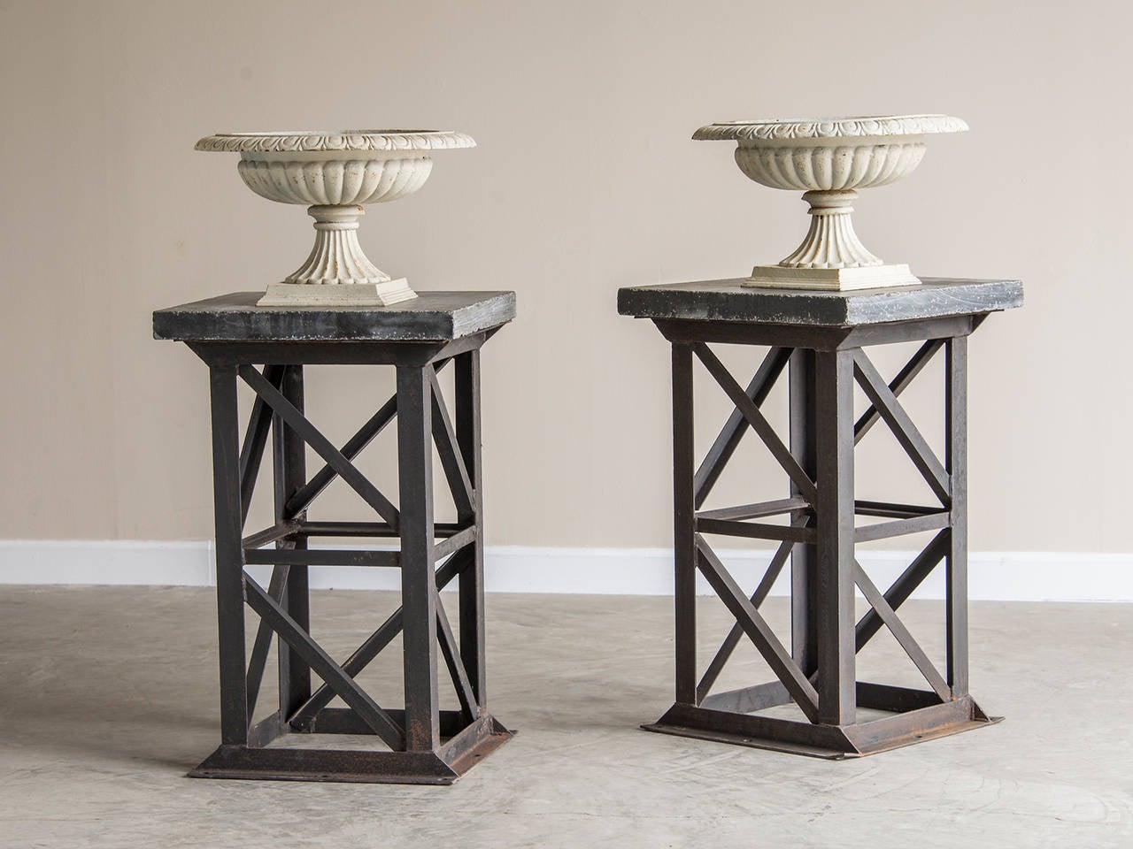 Art Deco industrial iron frame pedestal column, Holland, circa 1930, Bluestone Top. These angular pedestals or columns were originally open supports in a manufacturing plant built around 1930. Salvaged now and repurposed for domestic use each column