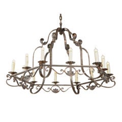 Antique Grand scale 12-light forged iron chandelier from France c. 1900
