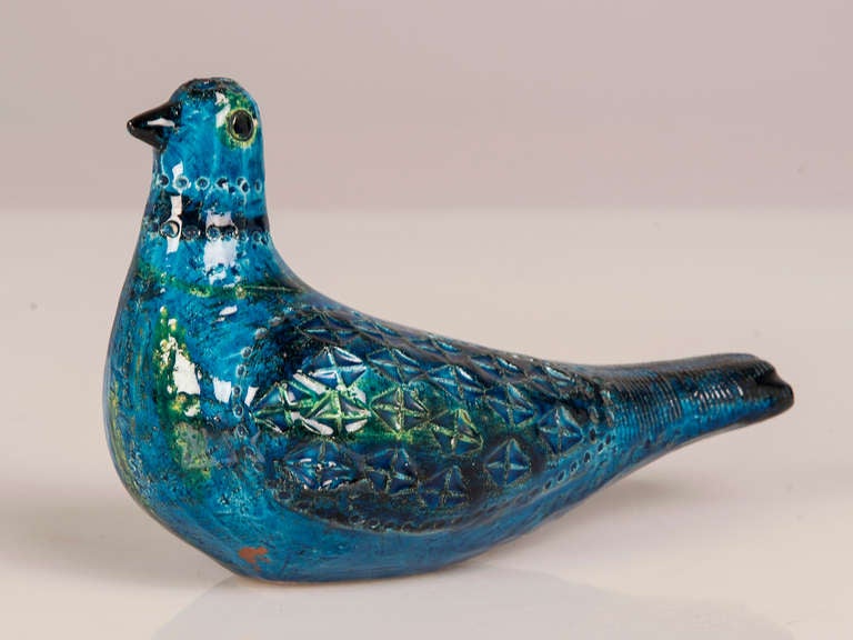 Receive our new selections direct from 1stdibs by email each week. Please click Follow Dealer below and see them first!

This charming turquoise glazed earthenware figure of a seat bird with the striking pattern of impressed markings was made in
