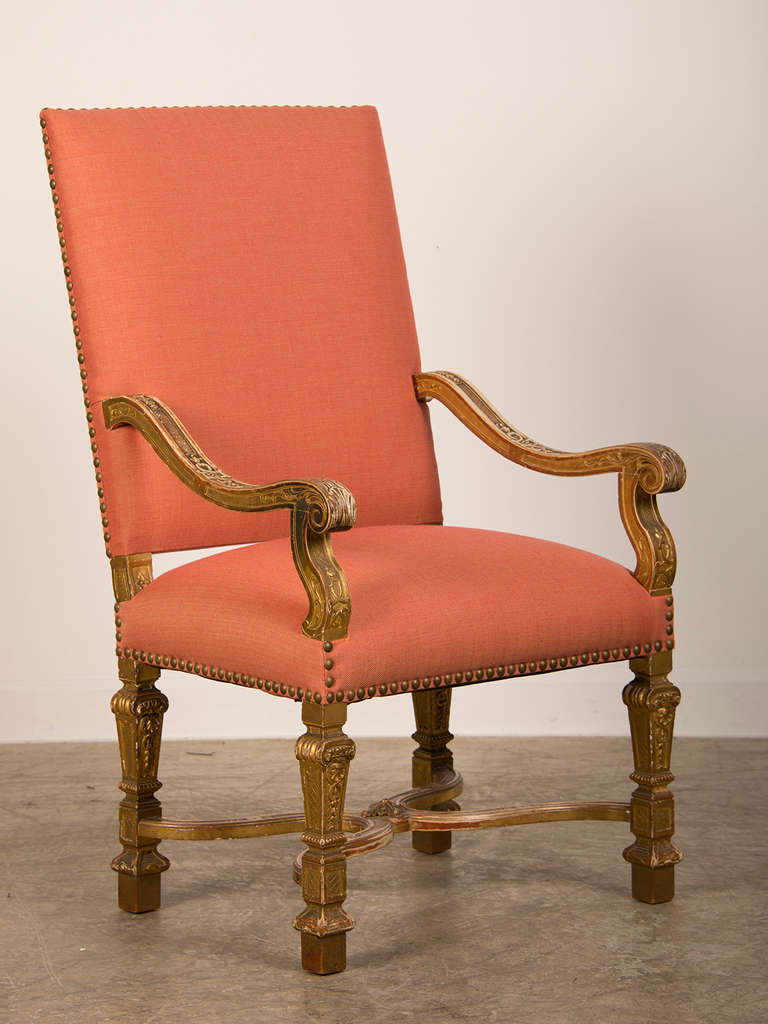 Louis XIV Style Giltwood Armchair, France c.1875, Freshly Upholstered. The handsome and stately armchair embodies the purpose of furniture created during the reign of Louis XIV (1643-1715). At this time the King of France was considered divine and