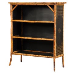 Scorched bamboo low bookcase from England c. 1885