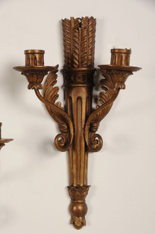 Pair of Louis XVI style gilded wood sconces from France c. 1910