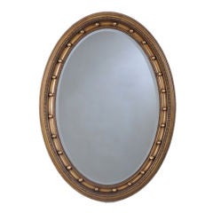 Antique Oval gilded mirror frame from England c. 1890