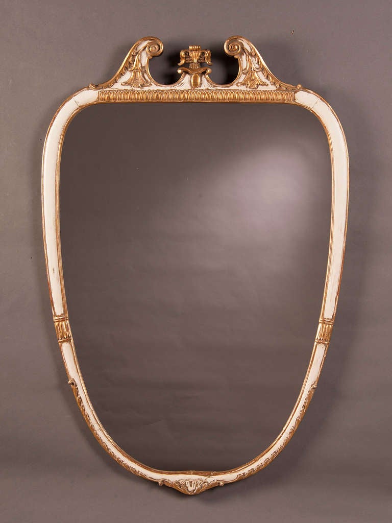 Receive our new selections direct from 1stdibs by email each week. Please click Follow Dealer below and see them first!

A striking Mid-Century painted and gilded vintage Italian neoclassical style frame enclosing the original mirror glass, circa