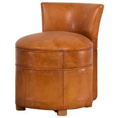Art Deco period round leather chair with a low back, France c.1930