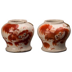 Pair of Kuang Hsu period Hand Painted Foo Lion vases, China C.1875
