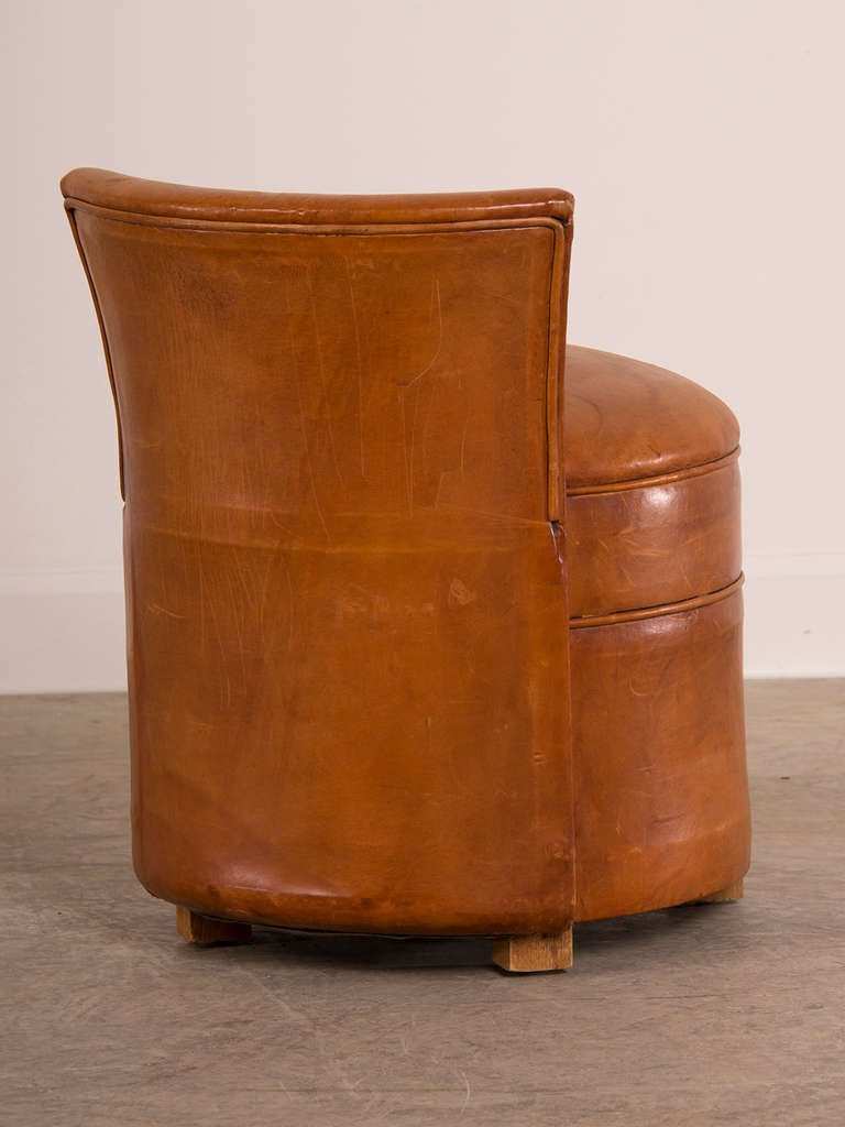 Mid-20th Century Art Deco period round leather chair with a low back, France c.1930