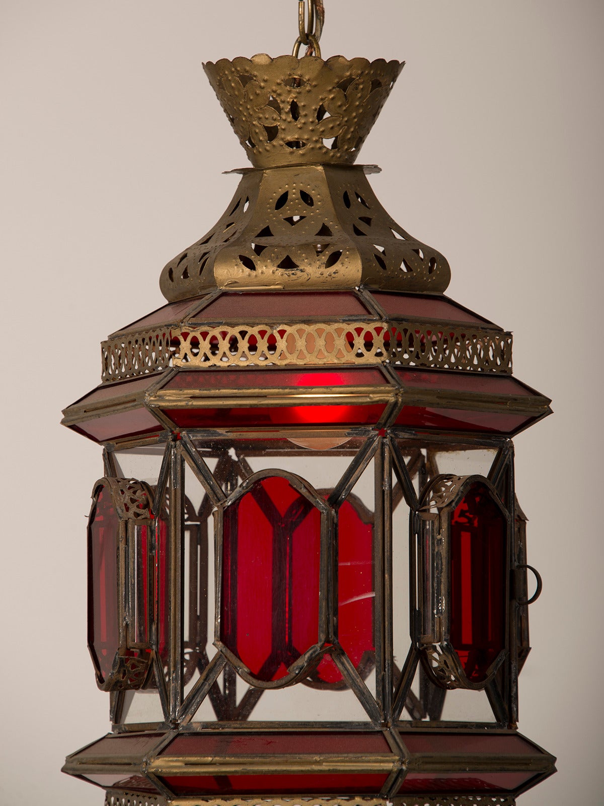 Moroccan Lantern circa 1940 Enclosing Ruby and Clear Glass with Filigreed Brass In Excellent Condition In Houston, TX