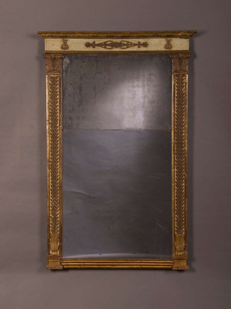 Empire period frame enclosing the original mirror glass from France c.1810