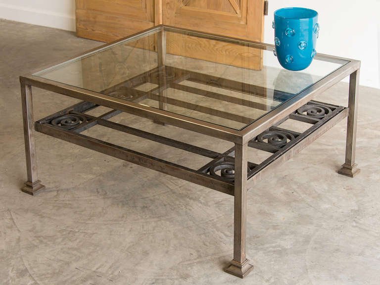 Art Deco Period Forged Iron Grate, France, circa 1930. Custom Mounted as a Coffee Table. The bold design of this iron grate identifies it as being forged during the Art Deco period where it was originally used as window grille installed for security