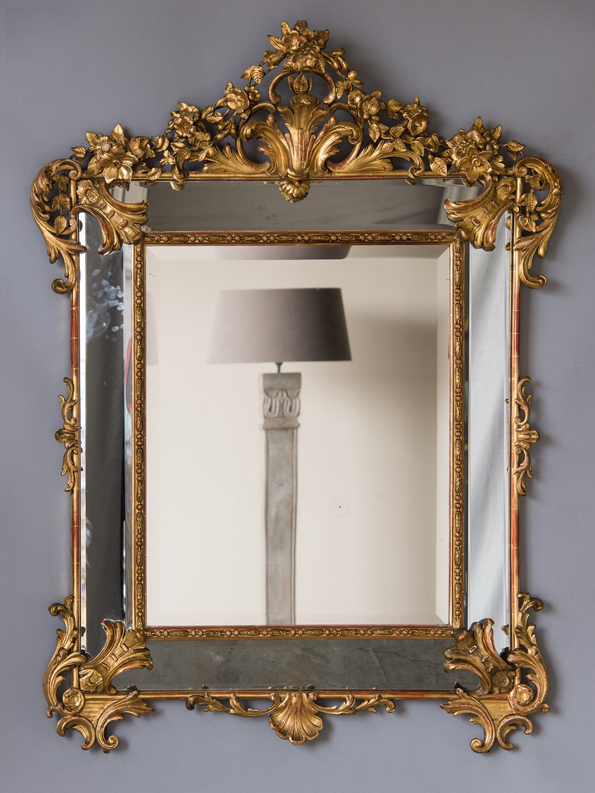 Receive our new selections direct from 1stdibs by email each week. Please click Follow Dealer below and see them first!

The gorgeous gold leaf frame that encloses the five separate pieces of the original mirror glass in this antique French mirror