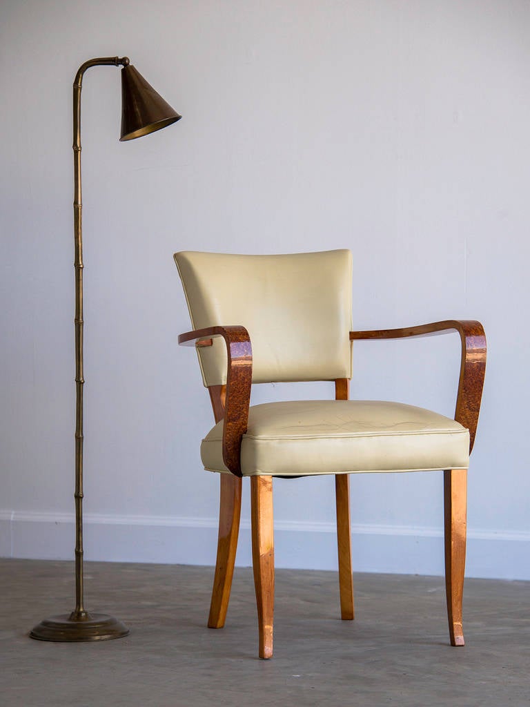 Art Moderne Period Burl Walnut Armchair, France c.1940. The sleek and shapely profile of this chair with its bold arms and saucy front legs immediately identify it as being from the 1940's. Much more lush than the architectural styling of the Art