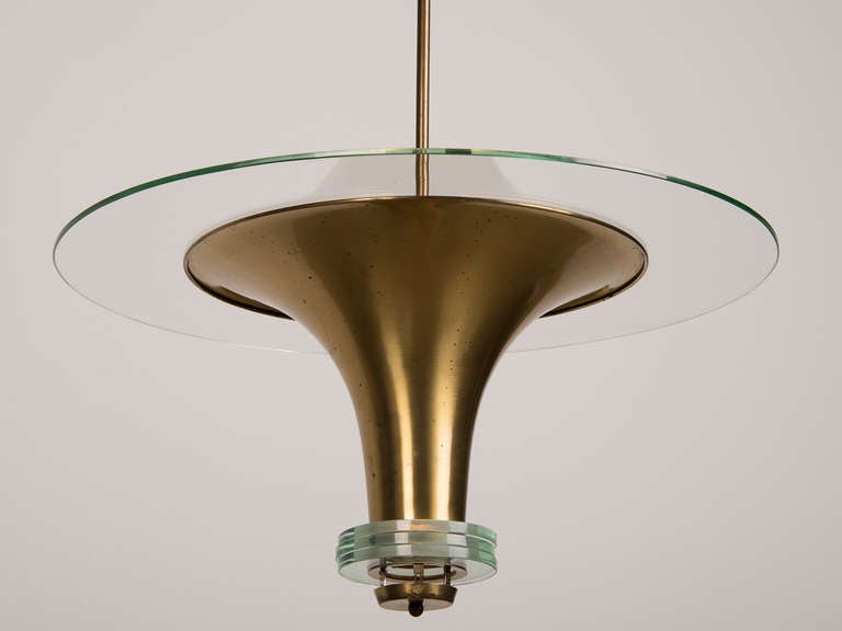 Art Deco Period Glass and Brass Pendant Chandelier, France c.1930. The striking inverted cone shape with its reflective brass coating possesses a sleek modern shape. The use of a large circular glass collar at the top of the pendant enlarges the