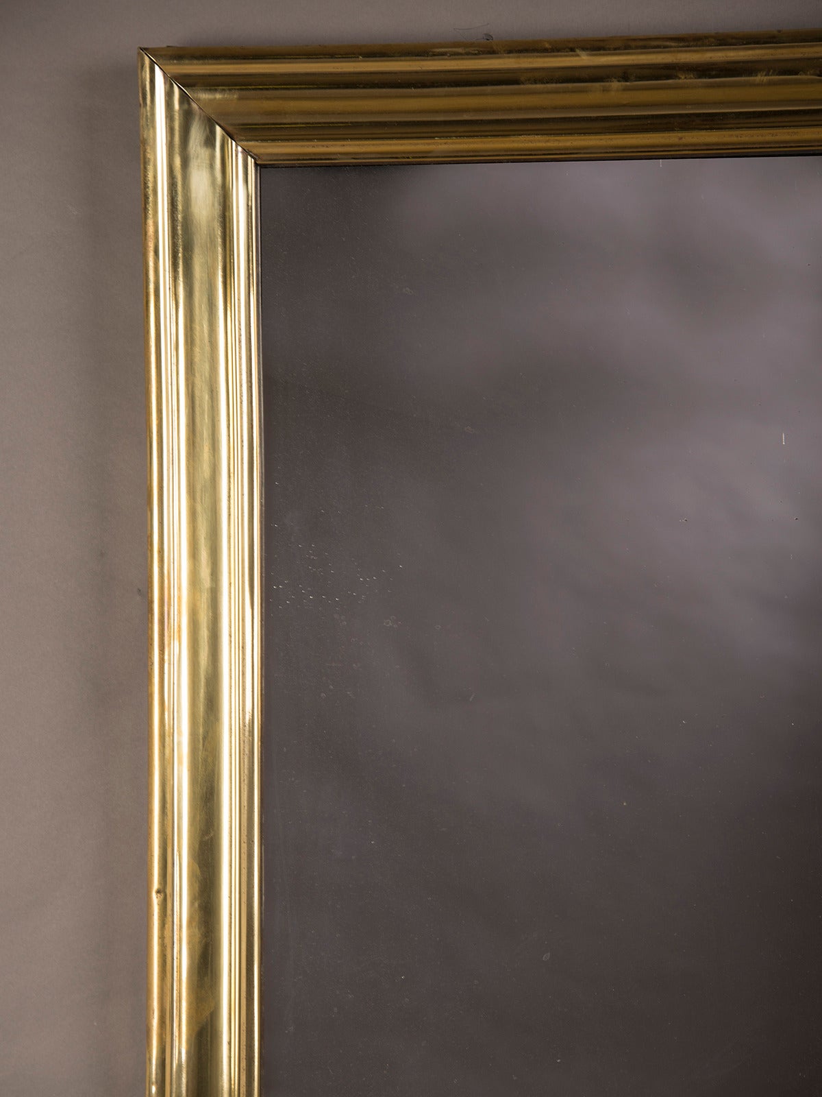 Hollywood Regency Brass Ribbed Frame Antique French Bistro Mirror, circa 1875