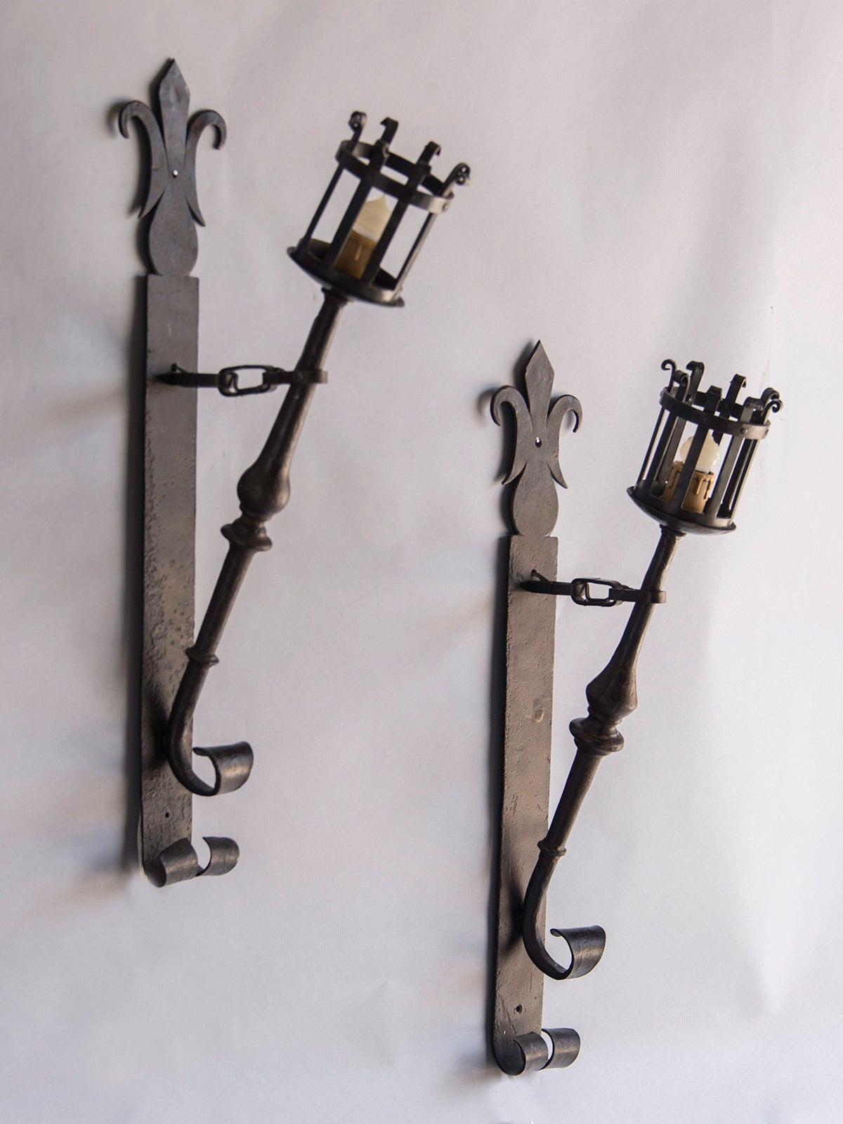 Receive our new selections direct from 1stdibs by email each week. Please click Follow Dealer below and see them first!

These imposing vintage French sconces circa 1910 have a boldly sculptural feel and have been electrified to be mounted