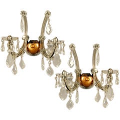 A pair of two arm sconces in the Marie-Therese style from France