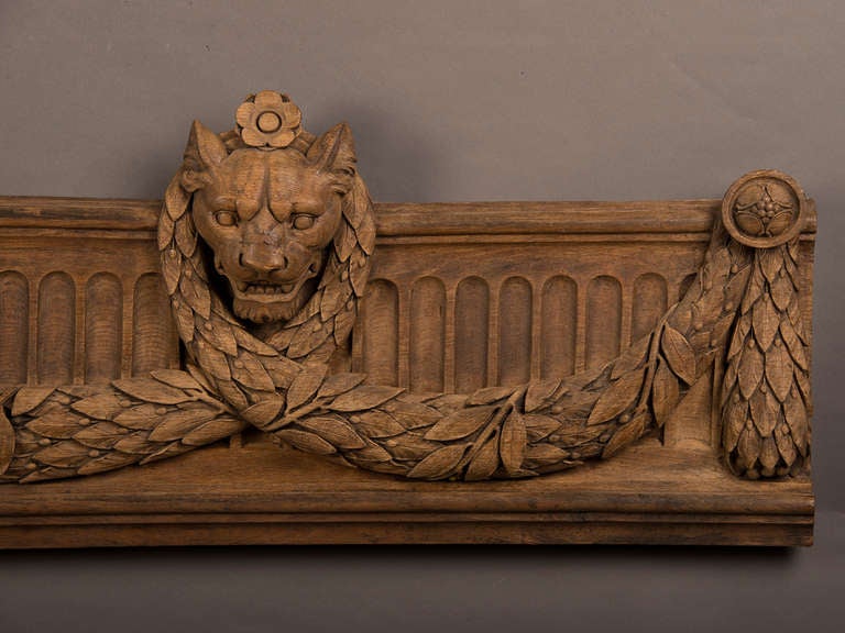 French Louis XVI Period Oak Carving circa 1790 with Lion Heads and Swag