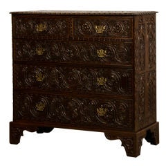 A Jacobean Revival oak chest of drawers from England c.1880