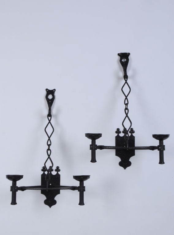 A pair of unique forged iron sconces from France c.1900