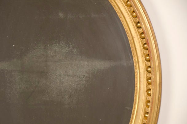 Lavish Antique French Louis XVI Style Oval Gold Leaf Mirror, circa 1880 In Excellent Condition In Houston, TX
