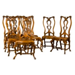 A set of eight stunning walnut side chairs from Italy c.1900