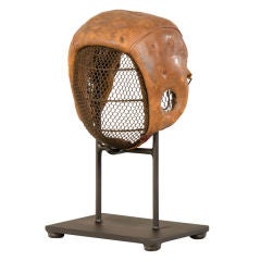 A leather and mesh fencing mask from France c.1890
