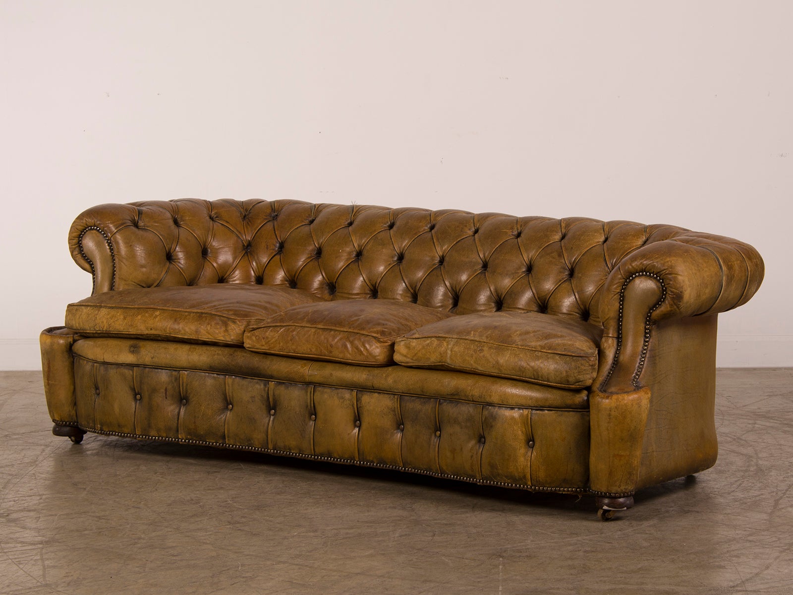 A Chesterfield sofa with a serpentine shape from England c.1920