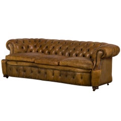 A Chesterfield sofa with a serpentine shape from England c.1920