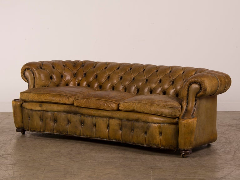 English A Chesterfield sofa with a serpentine shape from England c.1920
