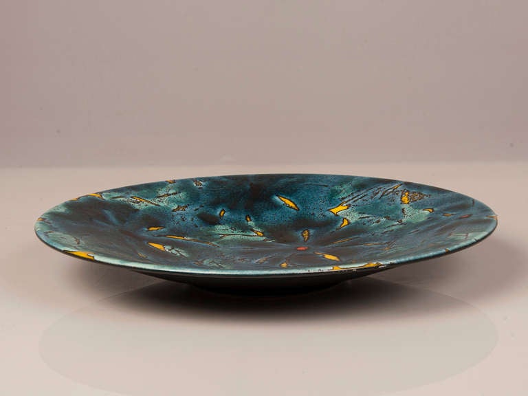 Receive our new selections direct from 1stdibs by email each week. Please click Follow Dealer below and see them first!

An enormous English circular platter with yellow and red flowers on a deep blue background with the mark 