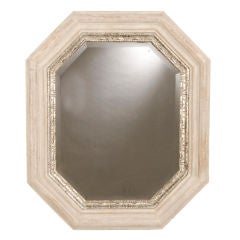 A painted octagon mirror with silver leaf from England c.1885