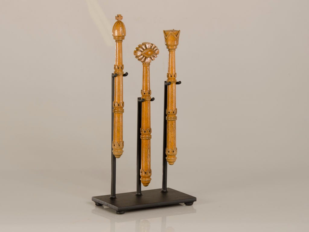 A set of three carved wooden batons used for juggling each with an individual motif from Italy c.1900. Please notice the wonderful detail that identifies these batons as part of a juggler's possessions. The shaft of each baton has an identical