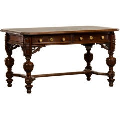 Antique A Gothic Revival style walnut writing table from England c.1875