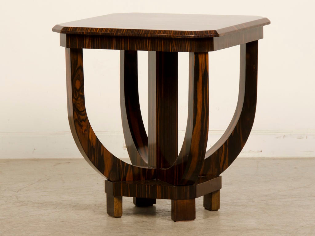 An extraordinary Art Deco period palisander wood table from France c.1930. The symmetry and balance of the elements that form this table contribute to a highly distinctive presence enhanced by the use of a rare timber known as palisander wood. It is