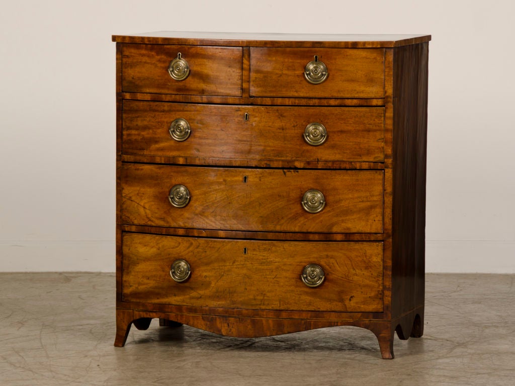 A Sheraton bow front chest from England c.1820