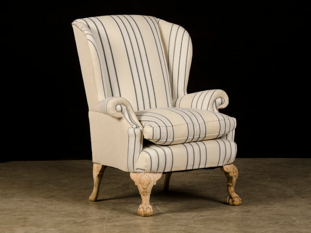 Receive our new selections direct from 1stdibs by email each week. Please click Follow Dealer below and see them first!

A grand Chippendale style antique English wing chair, circa 1880. This terrific armchair has been updated for the 21st century