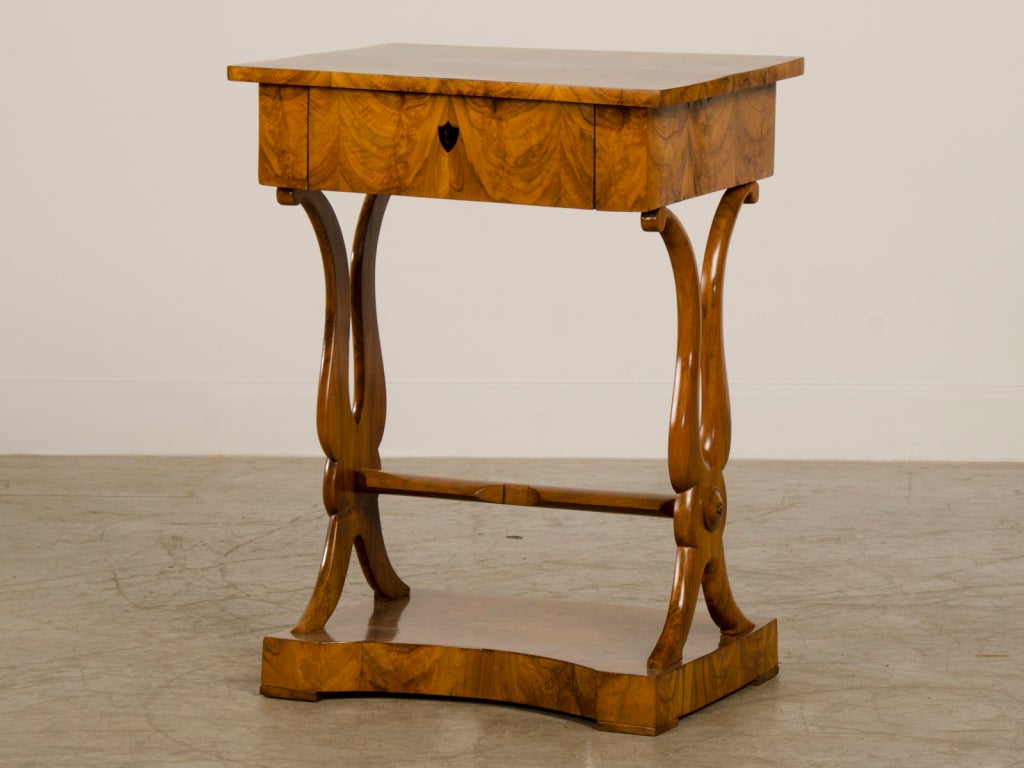 A stunning Biedermeier period burl walnut side table from Vienna, Austria c. 1830. Please take a moment to look at this superb example of cabinet making from the early nineteenth century with an amazing level of detailed workmanship. Every flat