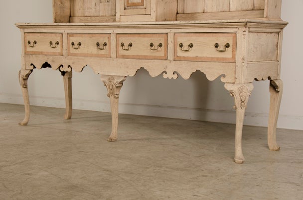 A Queen Anne style bleached oak welsh dresser from Great Britain 1