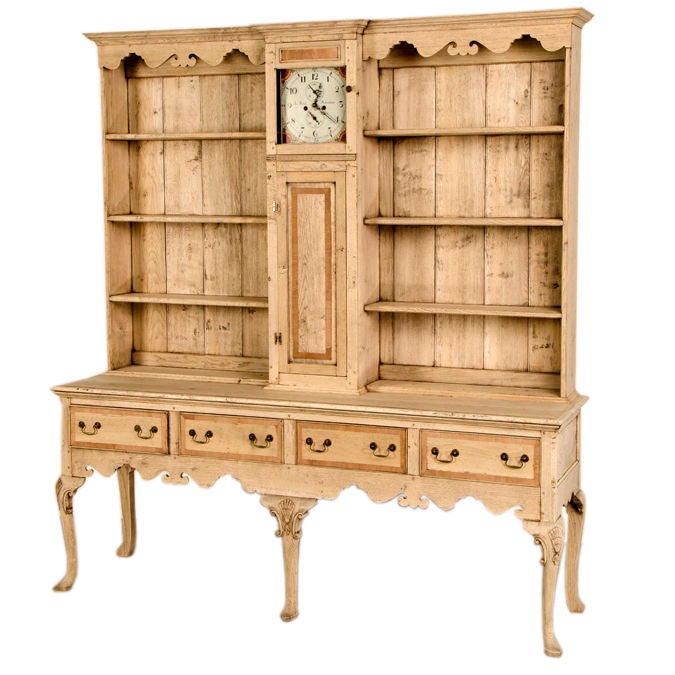 A Queen Anne style bleached oak welsh dresser from Great Britain