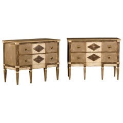 A matched pair of Neoclassical style painted chests from Italy