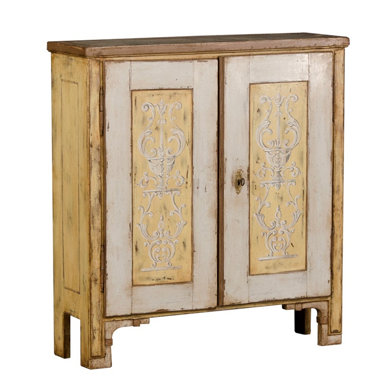 A shallow two door low painted cabinet from Germany c.1825