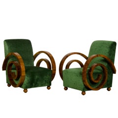 A pair of Art Deco period walnut armchairs from France c.1930