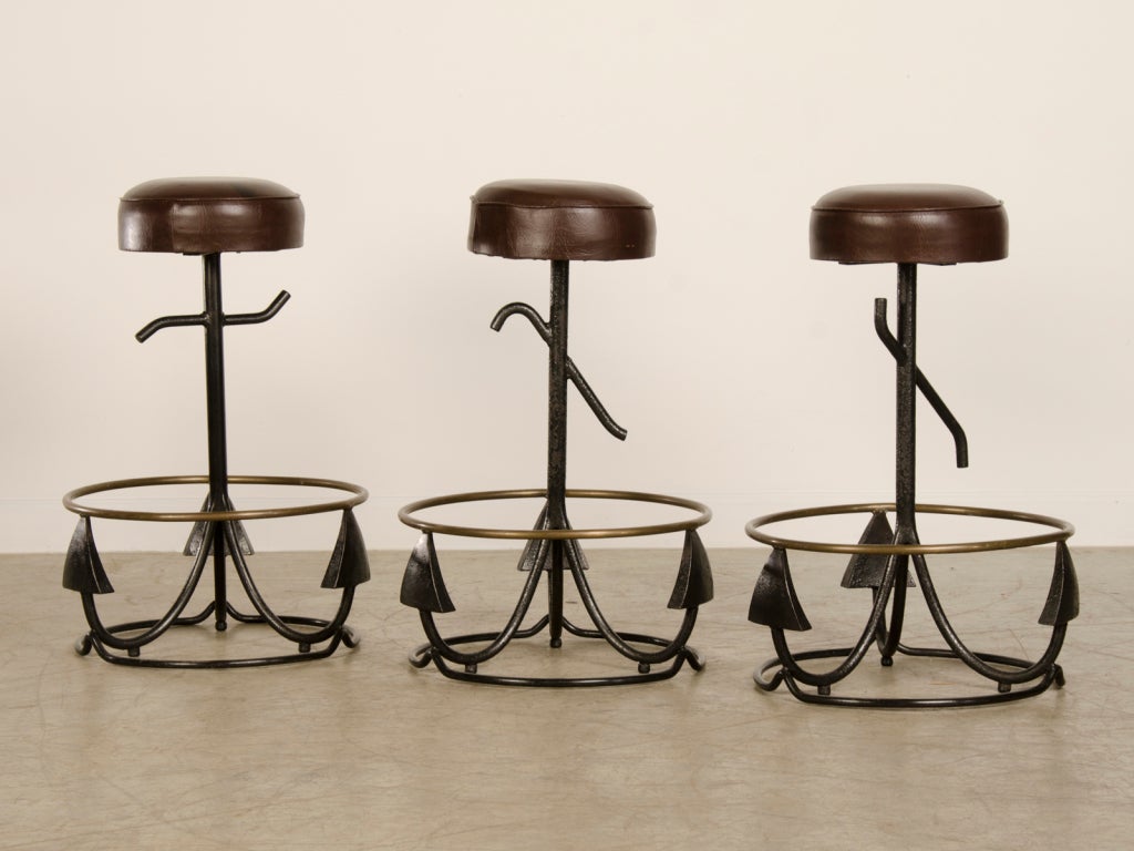 A set vintage iron and brass stools from Holland c.1940