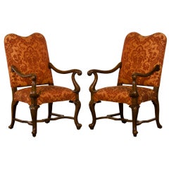 A pair of Rococo Revival oak armchairs from England c.1870