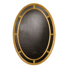 A Adams' neoclassical style gilded mirror from Engalnd c.1890