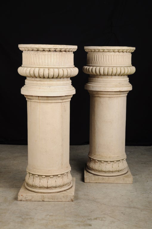 A pair of large columns made of stone from Italy